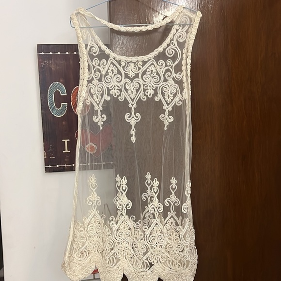 Sheer lace top from Spain. Fits sizes small, medium and large.Handmade detailing - Picture 3 of 3